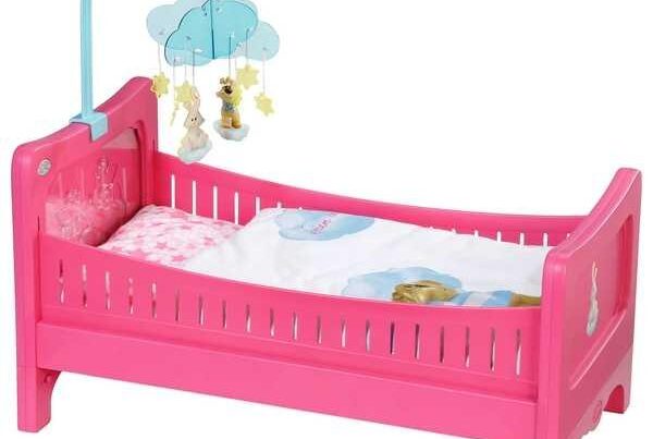 Dolly Cot with a Mobile and sounds